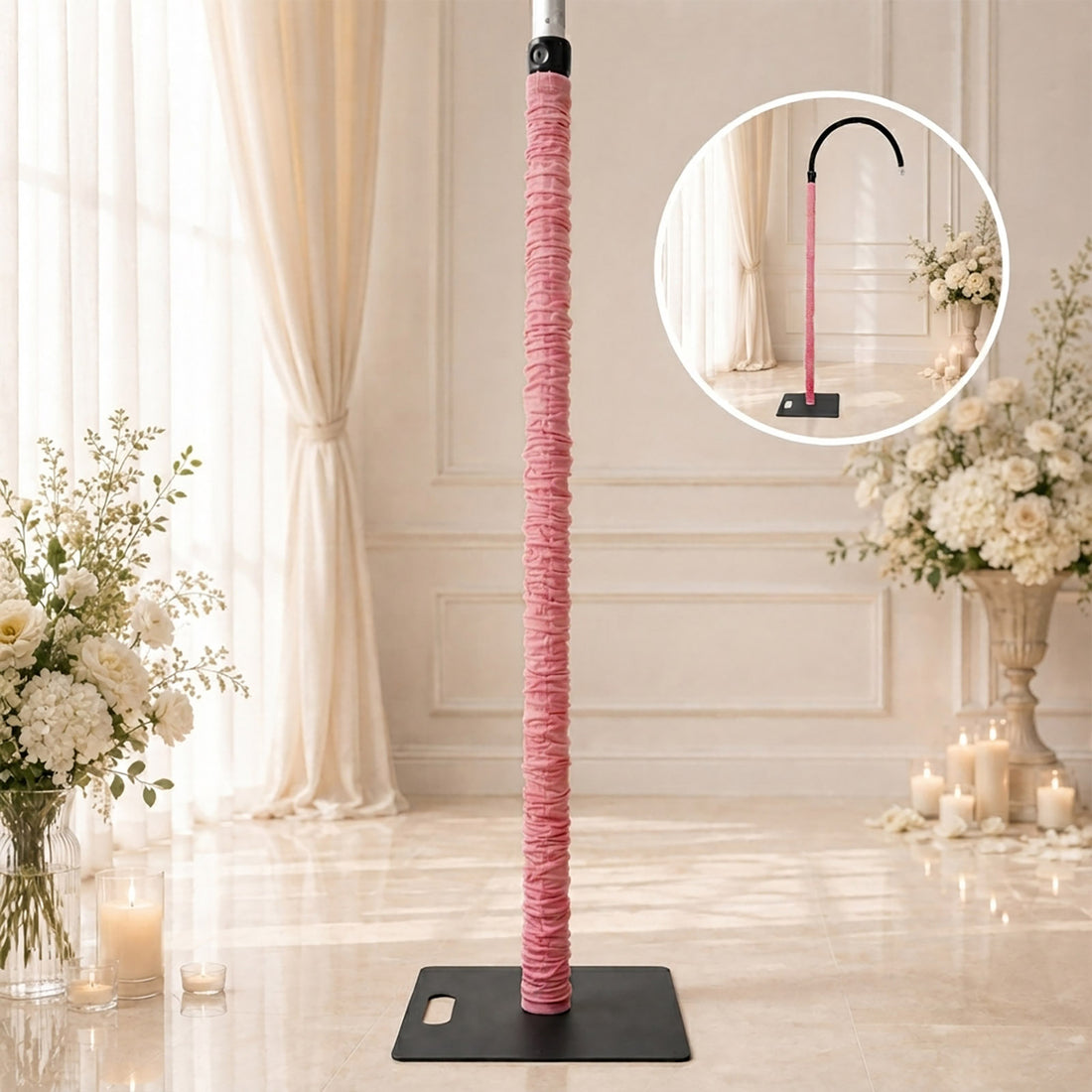 Pink pole dance pole with weighted base in elegant floral studio setup