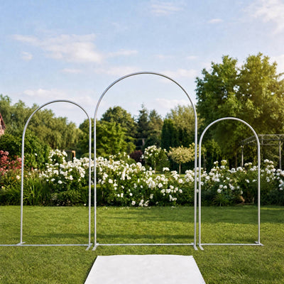 Elegant garden wedding arch backdrop on a lush outdoor lawn
