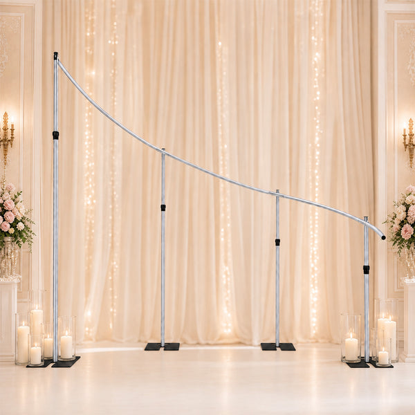 Elegant curved wedding backdrop stand with candles and floral decor