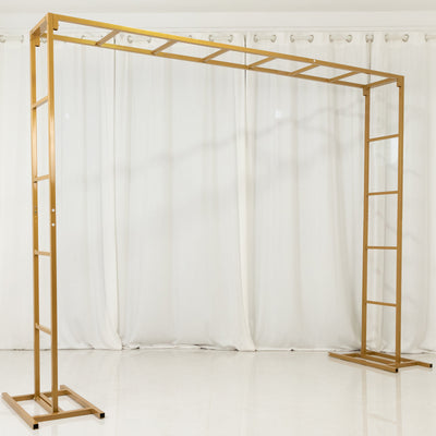 Gold metal photo backdrop stand for events and photography.
