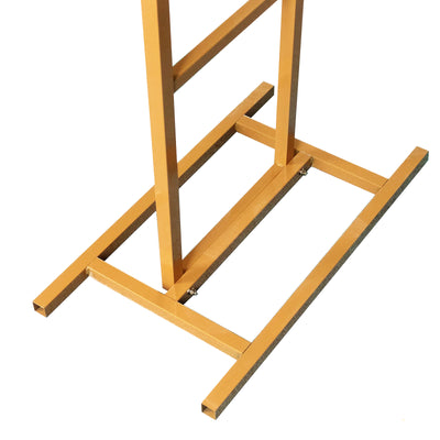 Yellow metal display stand with a stable base.