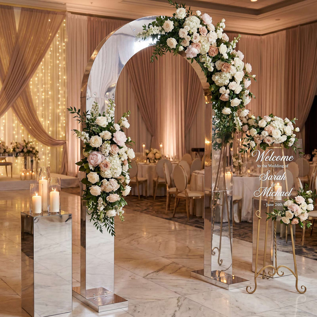 Luxury wedding ceremony arch with blush floral arrangements and welcome sign