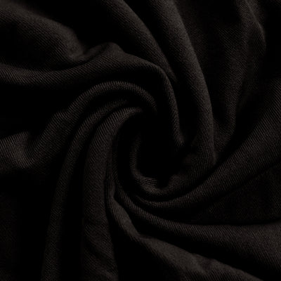 Black fabric texture with elegant swirl folds and dark draped background#whtbkgd