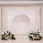 Elegant wedding stage backdrop with floral arrangements and blush roses