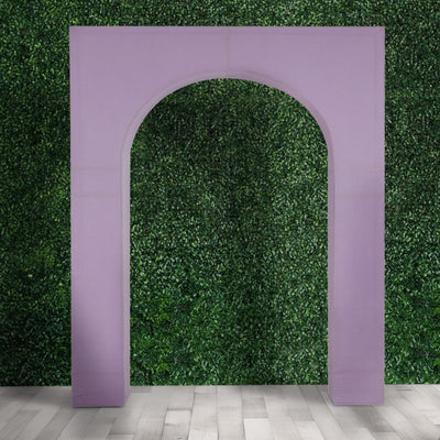 Purple archway display against a green backdrop.