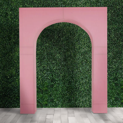 Pink archway backdrop for events and photography.
