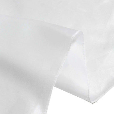White sheer fabric close-up texture with folded edge