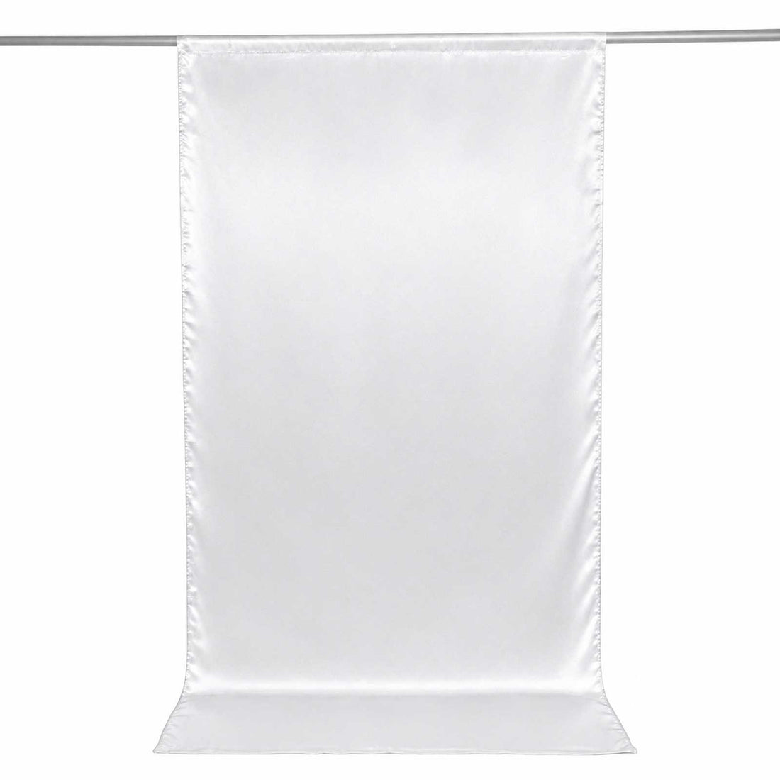 White hanging photo backdrop curtain on a rod