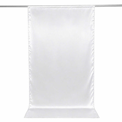 White hanging photo backdrop curtain on a rod