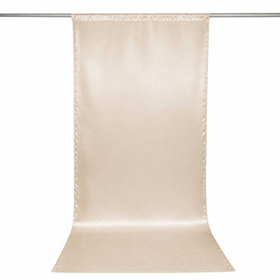 Beige satin backdrop curtain on a rod, elegant photo background