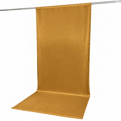 Gold satin photo backdrop drape hanging on a crossbar stand