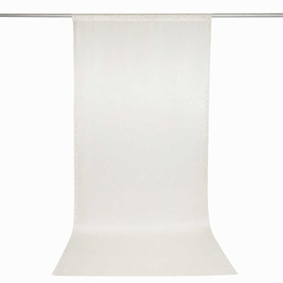 Off-white sheer curtain panel with rod pocket hanging on curtain rod