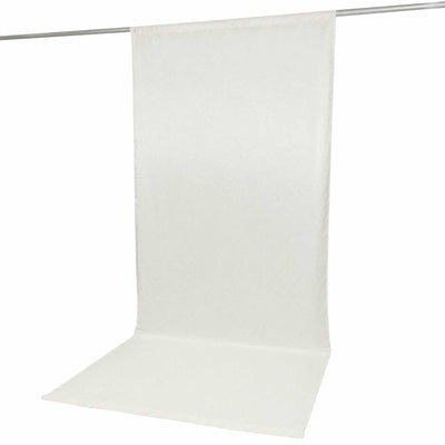 White photography backdrop with seamless floor sweep on support rod