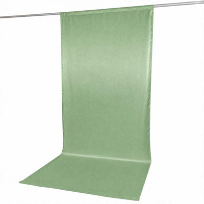 Green seamless fabric photography backdrop with floor sweep on rod