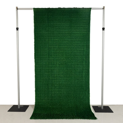 Green artificial grass backdrop on stand for photography
