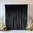 Black velvet backdrop with floral arrangements