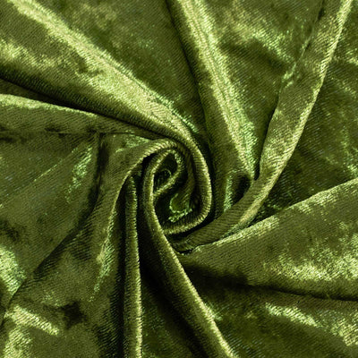 Shimmering green satin fabric close-up with rose-like folds#whtbkgd