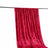 Red velvet fabric draped on a rod, showcasing its rich texture and color.