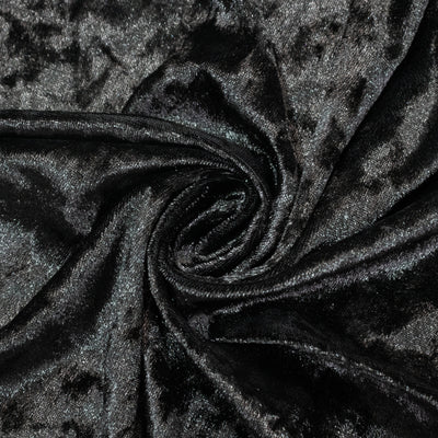 Black velvet fabric with a soft, luxurious texture. #whtbkgd