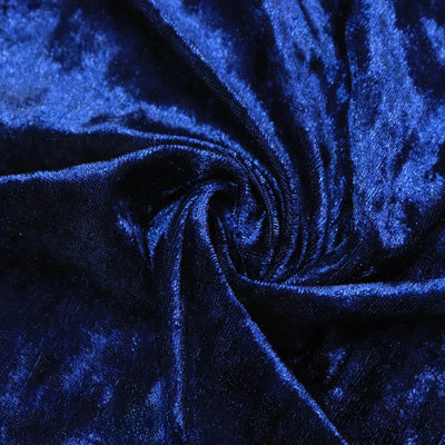 Shiny royal blue velvet fabric swirl close-up#whtbkgd