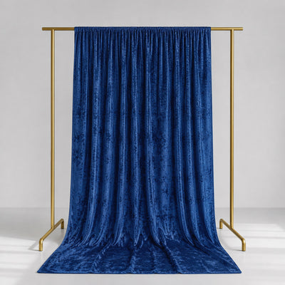 Royal blue velvet curtain on gold backdrop stand, luxury draped fabric
