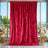 Red velvet curtain backdrop with gold frame and floral wedding decor