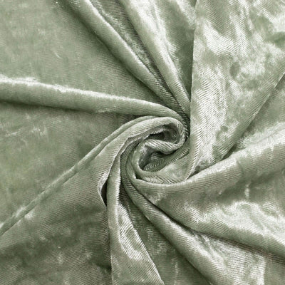 Shiny sage green velvet fabric close-up texture with swirling folds#whtbkgd
