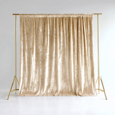 Champagne velvet backdrop on a gold frame for photography or events