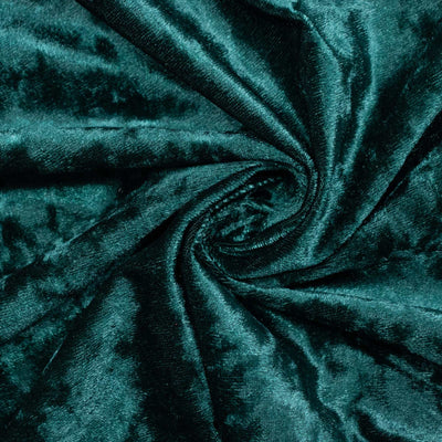 Teal velvet fabric texture with elegant swirl folds#whtbkgd