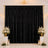 Elegant black wedding backdrop with gold frame and white floral arrangements