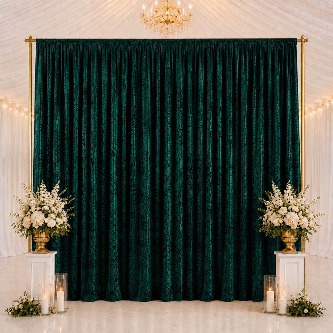Elegant emerald green velvet backdrop with gold frame and floral decor