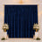 Elegant navy blue curtain backdrop with floral arrangements and gold accents