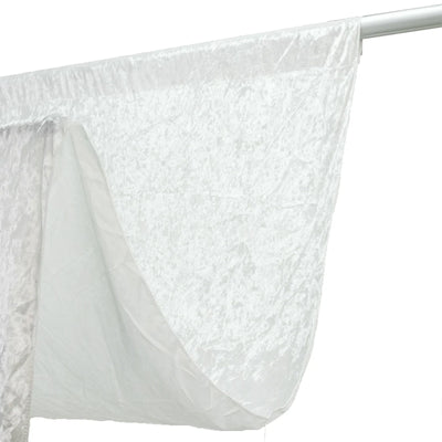 White sheer fabric draped over a metal rod on a plain background