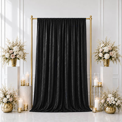 Black velvet curtain with gold frame and elegant floral wedding decor
