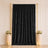 Black velvet backdrop curtain with gold frame and floral pedestal decor