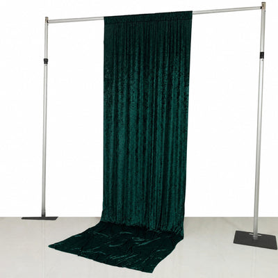 Emerald green velvet backdrop curtain on adjustable stand with poles