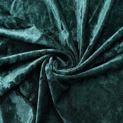 Dark green velvet fabric texture with spiral folds and soft sheen#whtbkgd