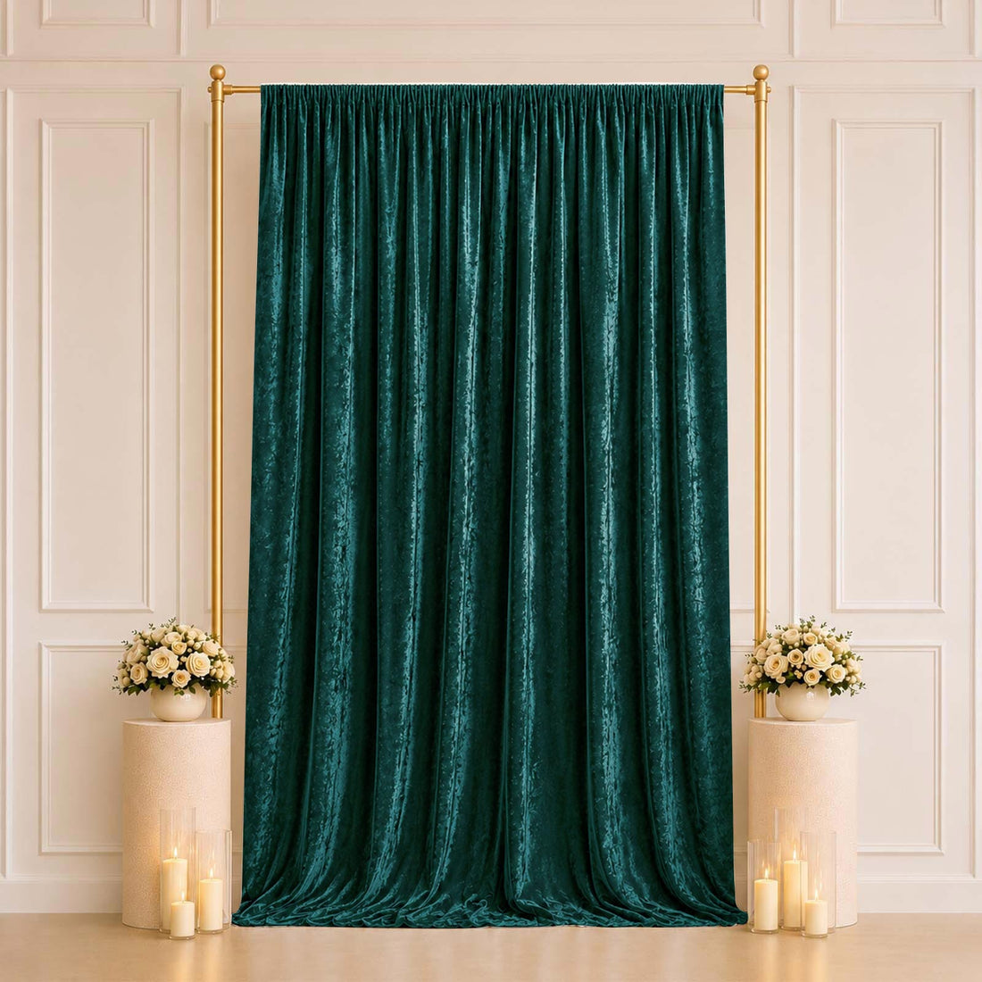 Emerald green velvet curtain backdrop with gold stand and floral decor