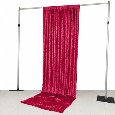 Adjustable pipe and drape backdrop stand with red velvet curtain