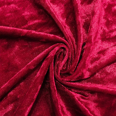Red velvet fabric texture with swirled folds and glossy sheen#whtbkgd