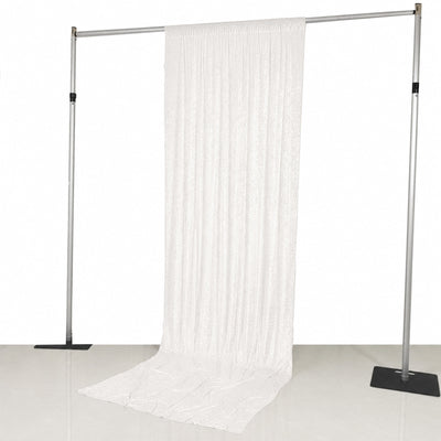 White sheer curtain on adjustable backdrop stand with metal poles

