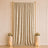 Elegant gold draped backdrop with floral pedestals and candles