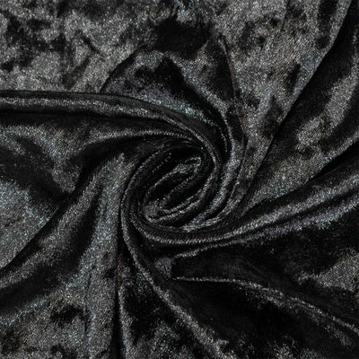 Black velvet fabric texture with swirling folds and shimmering sheen#whtbkgd