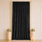 Black velvet draped backdrop with gold frame, floral pedestals and candles