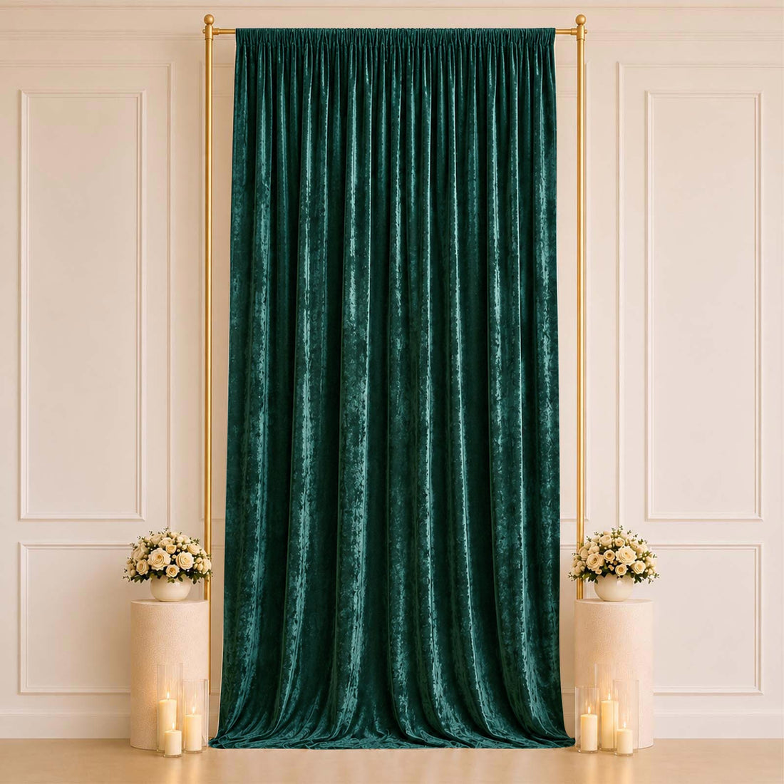 Emerald green velvet curtain with gold frame and floral candle décor