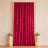 Elegant red velvet curtain backdrop with floral pedestals and candles