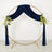 Navy velvet draped wedding arch with gold circle and floral arrangements