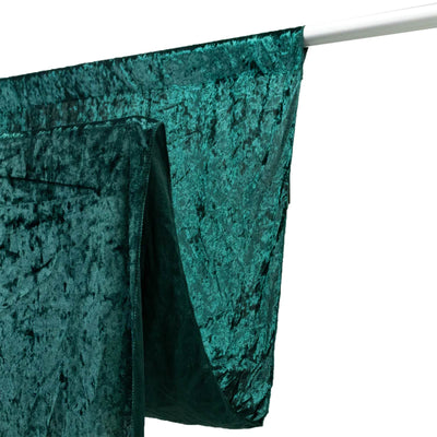 Emerald green velvet curtains on a silver rod