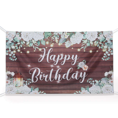 Happy Birthday banner with floral design and rustic wood background.