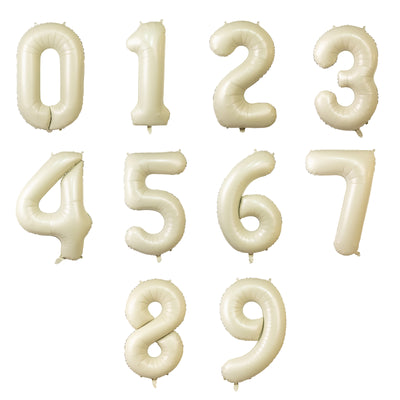 Cream-colored balloon numbers 0 through 9 on a white background.
